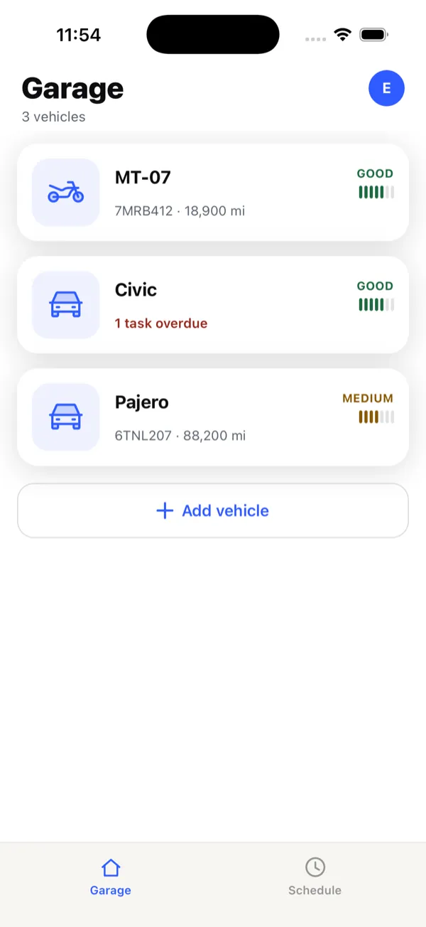The WheelNotes garage screen listing three vehicles, each with a condition rating and one flagged as having an overdue task.